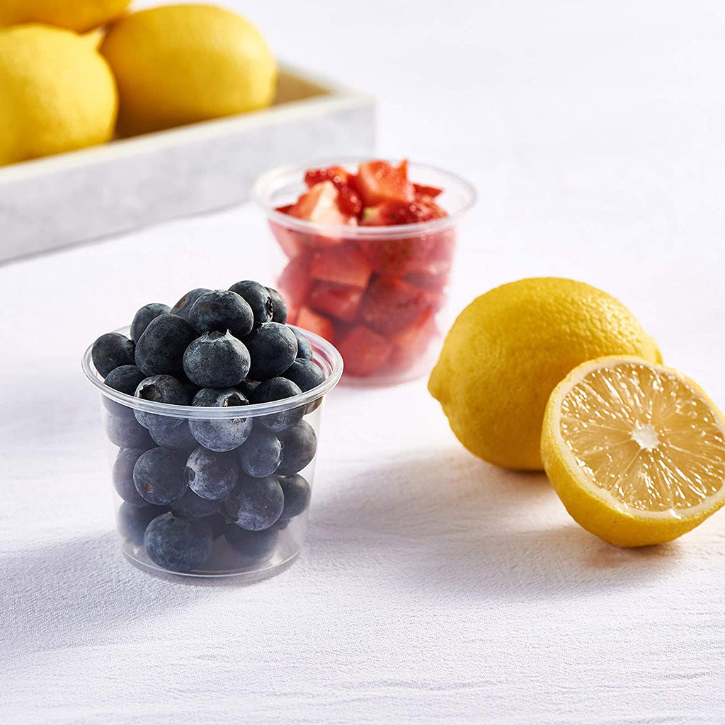 5.5oz Clear Sauce Cup with strawberries and blue berries in it