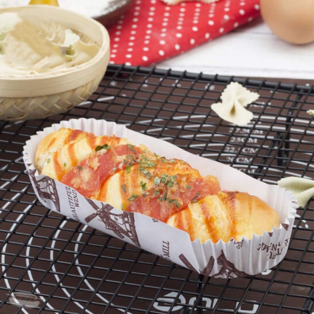 Beautiful Wind mill oval baking paper cup dessert for bakery store on a rack