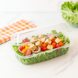 J131 PET Clear Rectangular Hinged Container 8.58x4.57x3.2" with salad in it